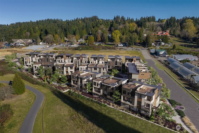 birds eye view of property with a residential view