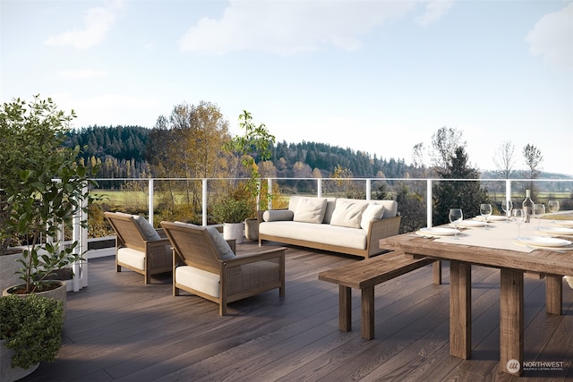 deck featuring an outdoor hangout area and a forest view