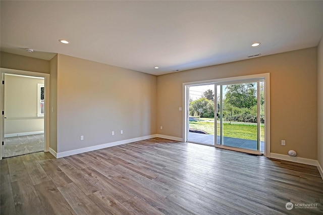 empty room featuring light hardwood / wood-style flooring