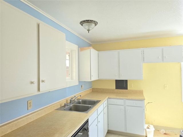 kitchen with dishwashing machine, a sink, white cabinets, light countertops, and ornamental molding