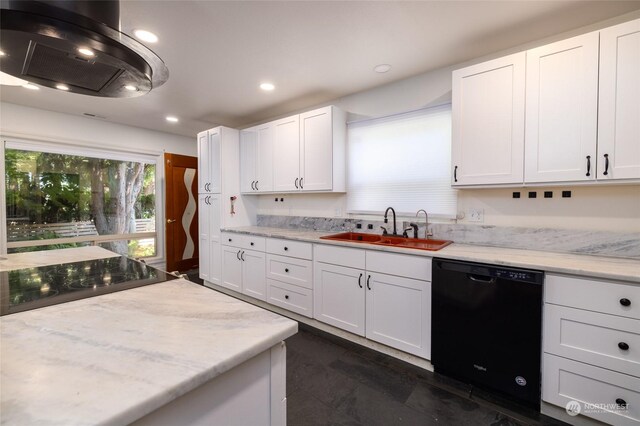 kitchen with sink, black appliances, white cabinetry, and dark tile patterned floors