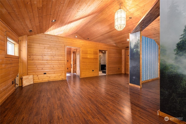 unfurnished room featuring wooden ceiling, wooden walls, dark wood-style floors, and vaulted ceiling