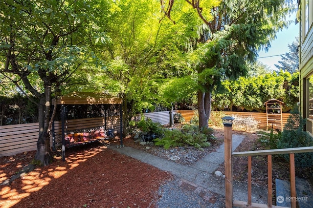 view of yard with fence