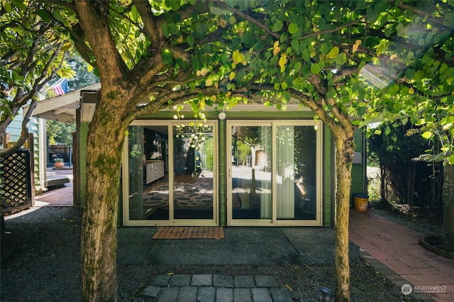 entrance to property with a patio area