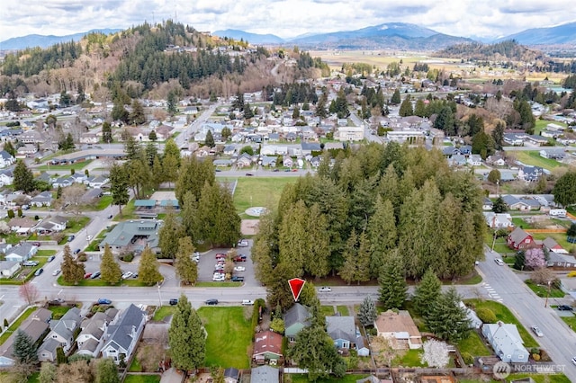 1100 Greenleaf, Burlington, WA 98233 - drone / aerial view with a mountain view and a residential view