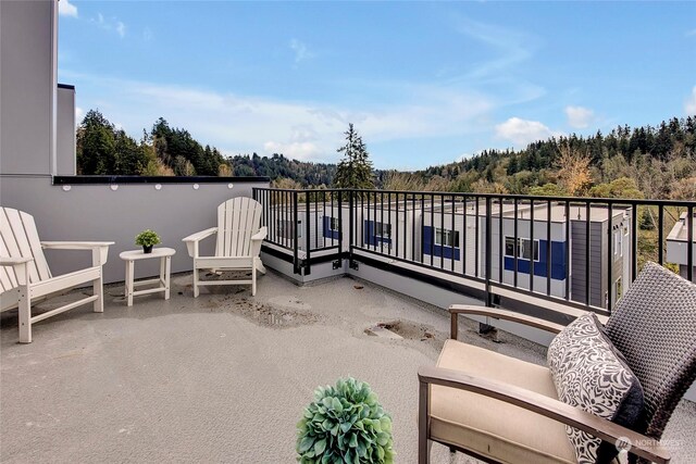 view of patio / terrace with a balcony