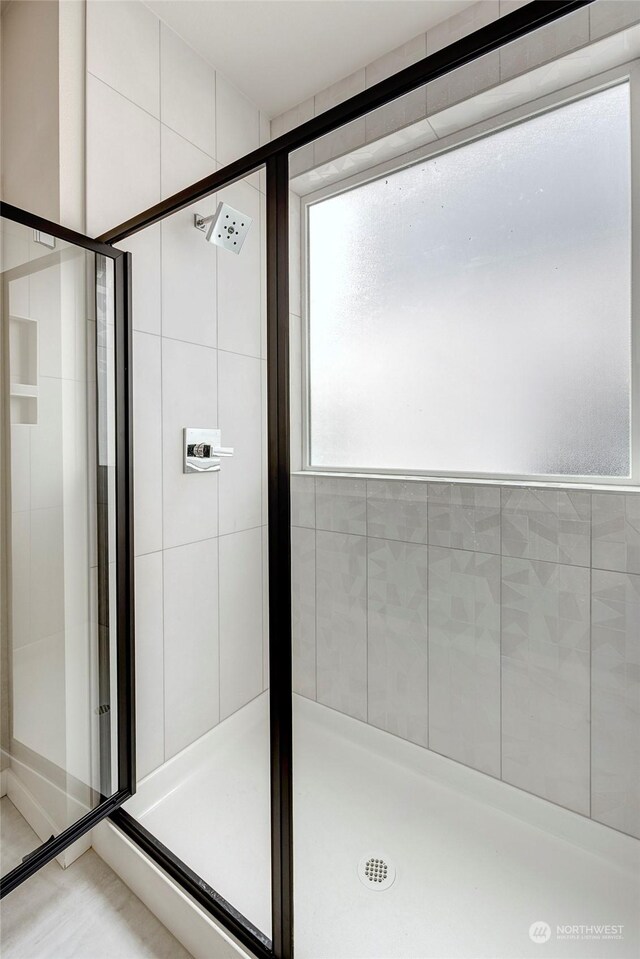 bathroom with walk in shower