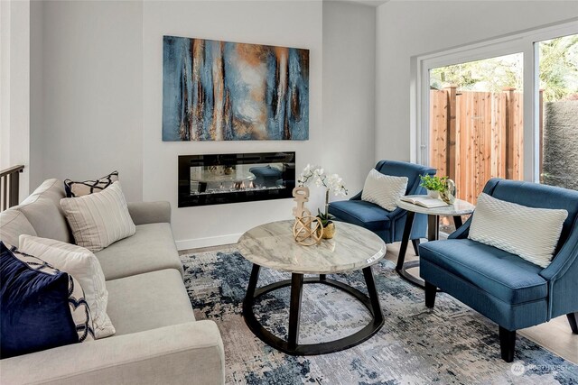 sitting room featuring hardwood / wood-style floors