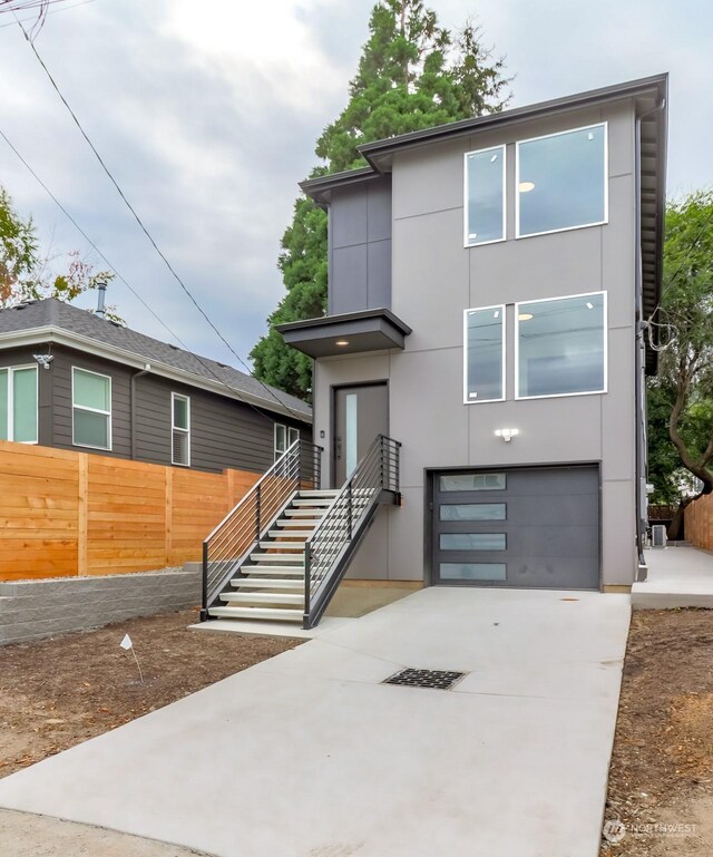 modern home featuring a garage