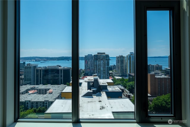 balcony featuring a water view