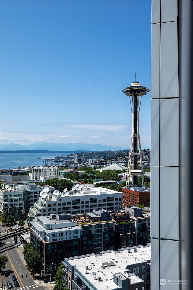 property's view of city featuring a water view