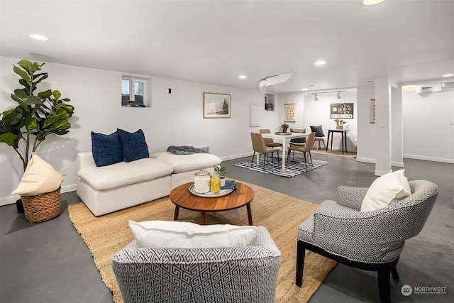 living room featuring concrete flooring