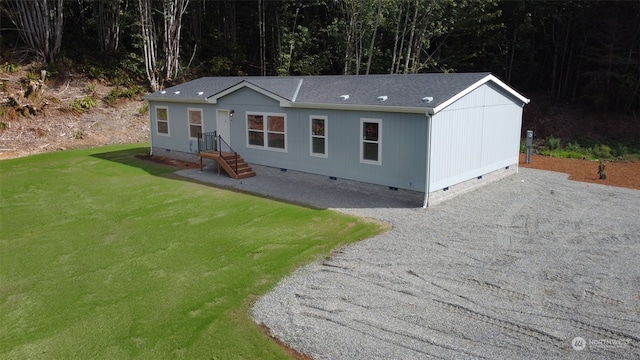 view of front of house with a front lawn