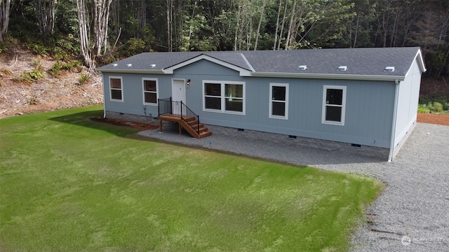 view of front of home featuring a front yard