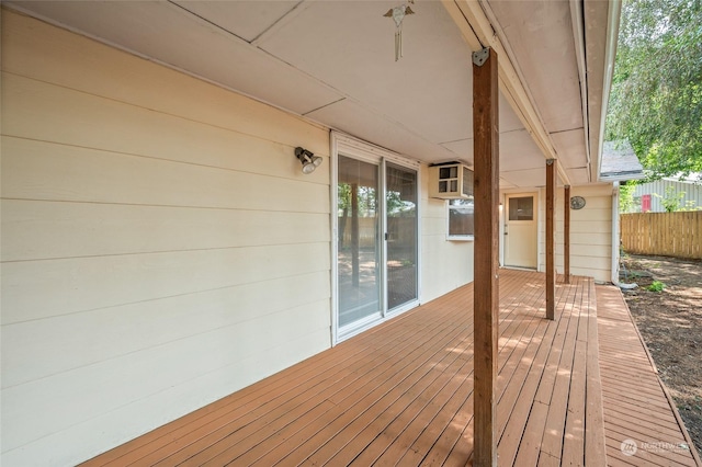 wooden deck featuring fence
