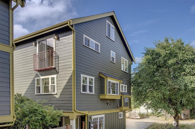 view of property exterior featuring a balcony