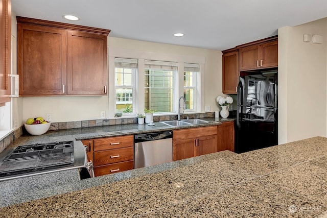 kitchen with appliances with stainless steel finishes and sink