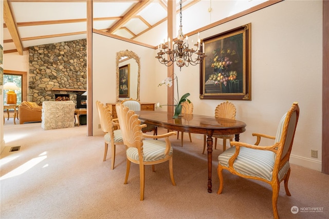 dining space featuring vaulted ceiling with beams, visible vents, a fireplace, and carpet floors