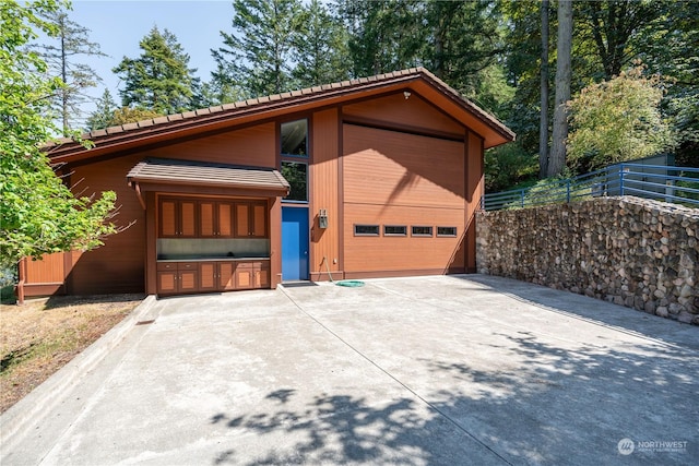 garage featuring fence