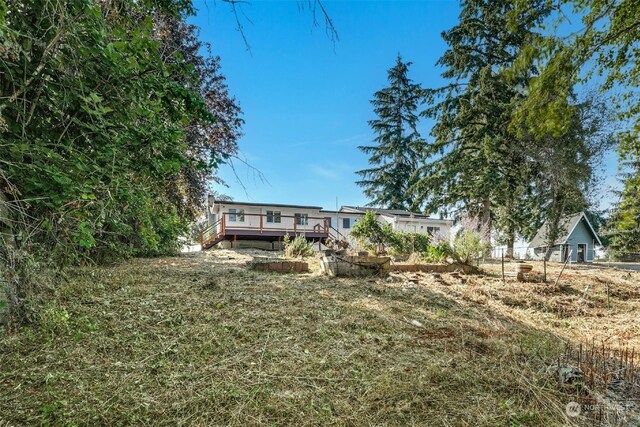 view of front of property featuring a deck