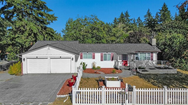 single story home with a garage