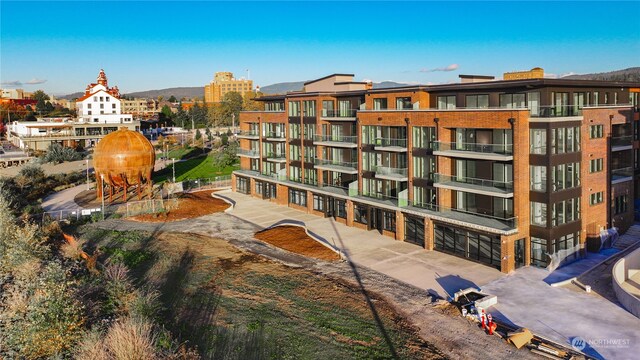 view of building exterior featuring a mountain view