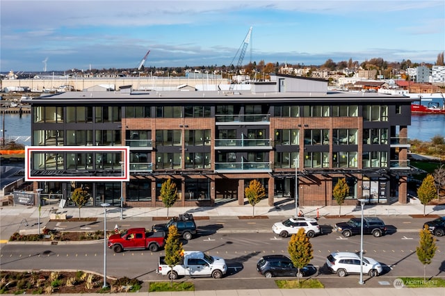 view of building exterior with a water view