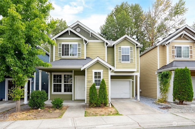 view of front of home featuring a garage, driveway, and board and batten siding