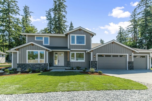 craftsman inspired home featuring a garage, stone siding, driveway, a front lawn, and board and batten siding