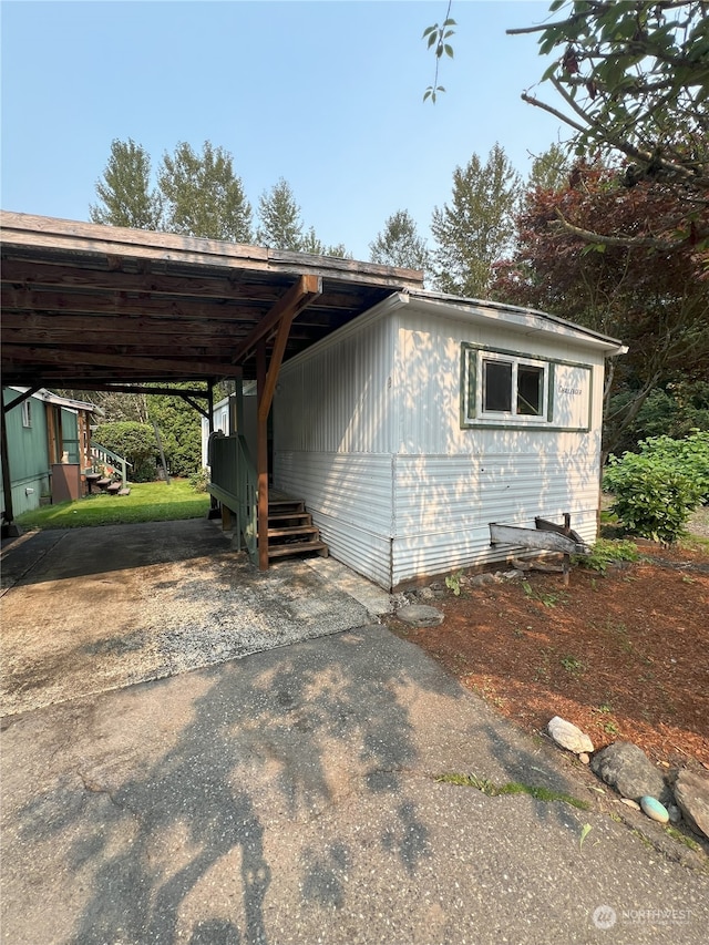 exterior space featuring a carport