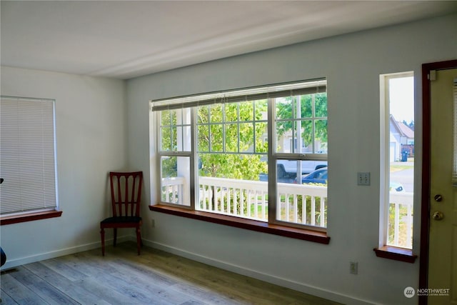 empty room with light hardwood / wood-style floors