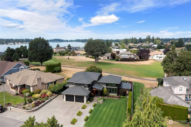 birds eye view of property featuring a water view