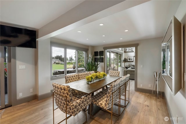 dining space featuring light hardwood / wood-style flooring