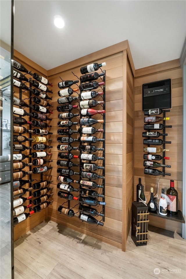 wine area with wood-type flooring