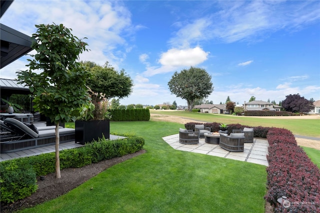 view of yard with a patio area and an outdoor living space