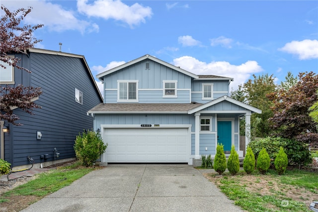 view of front of property featuring a garage