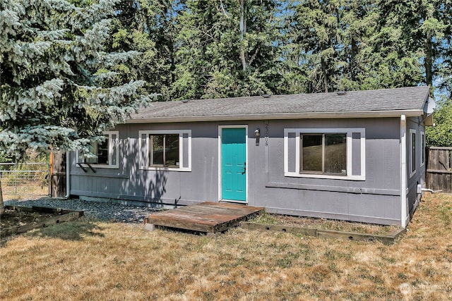 view of front of home with a front yard