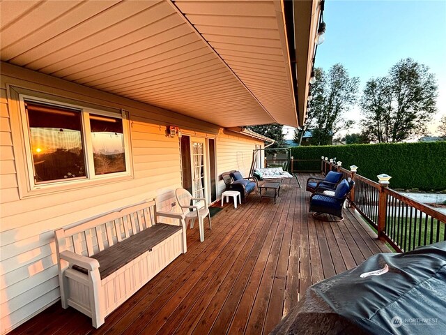 deck featuring outdoor lounge area