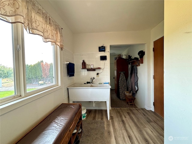 miscellaneous room featuring hardwood / wood-style flooring