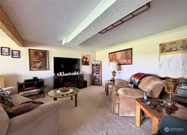 carpeted living room featuring a textured ceiling