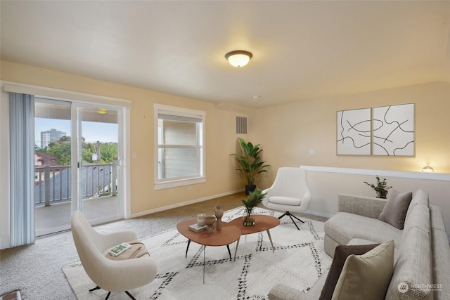 403 N I St, Tacoma, WA 98403 - carpeted living room featuring baseboards and visible vents