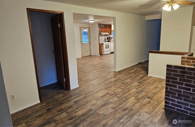 hallway with wood-type flooring