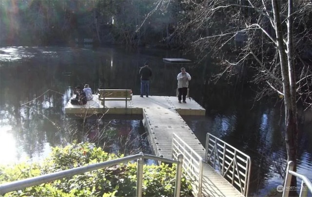 view of dock with a water view