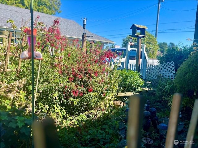 view of jungle gym with fence