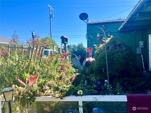 exterior details with electric meter and fence