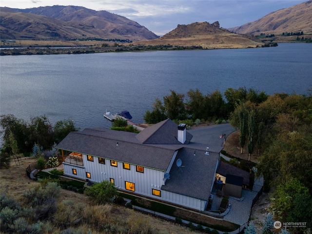 bird's eye view featuring a water and mountain view