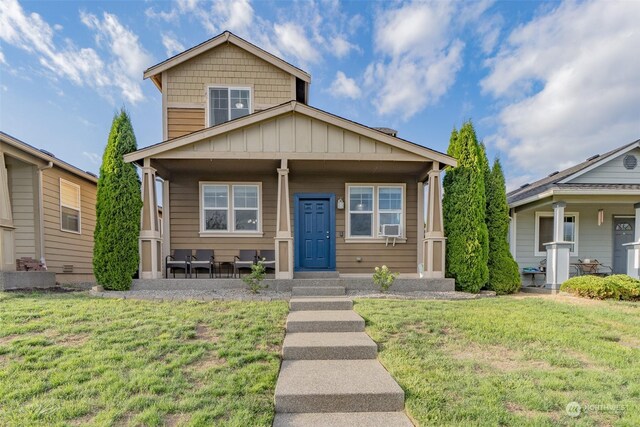 bungalow with a front yard