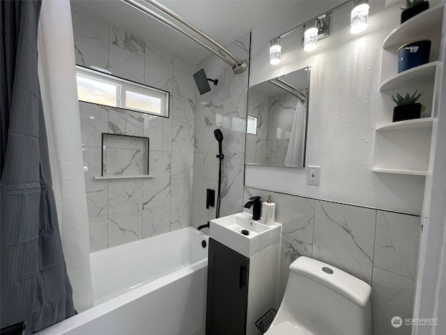 full bathroom with tile walls, toilet, shower / bath combination with curtain, and vanity