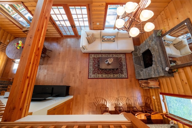 interior space featuring french doors, rustic walls, and wood walls