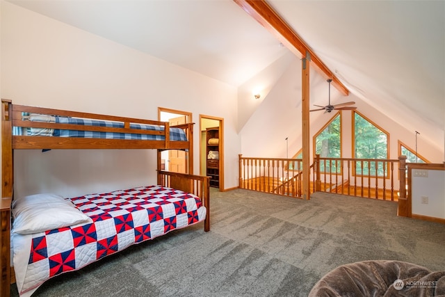 bedroom with carpet and vaulted ceiling with beams